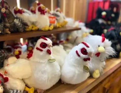plush chickens in the gift shop at The Comedy Barn