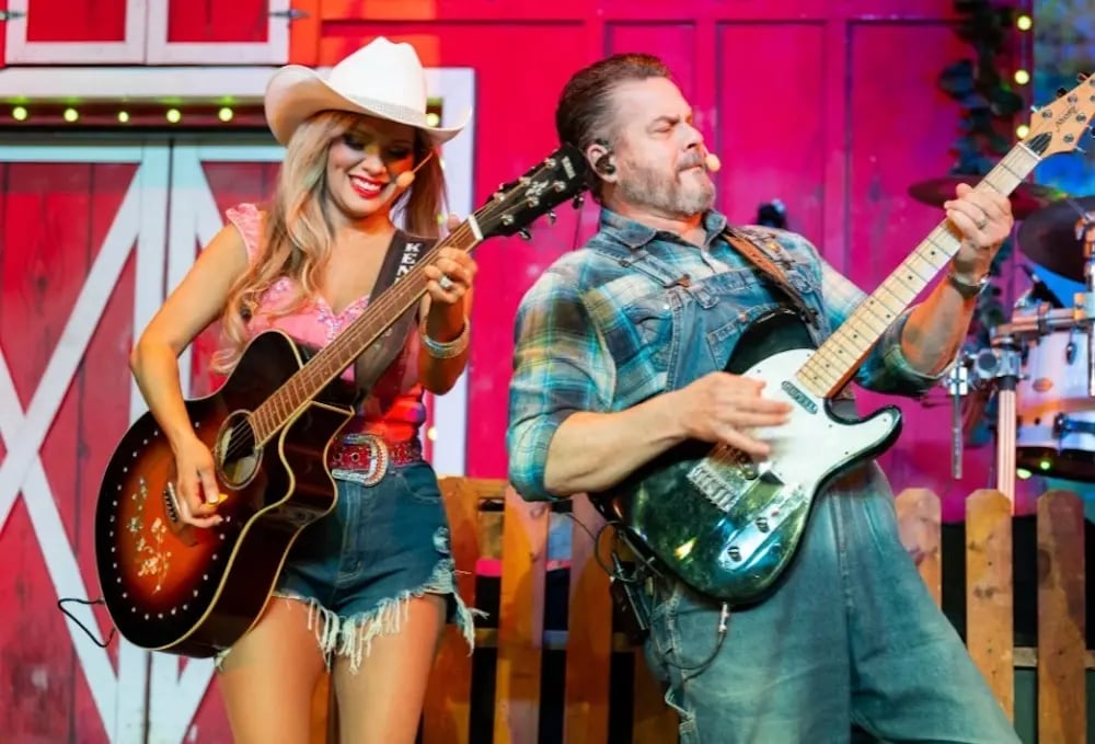 singers at the Comedy Barn playing guitars