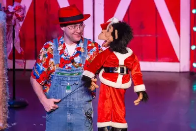 ventriloquist with monkey during Christmas show